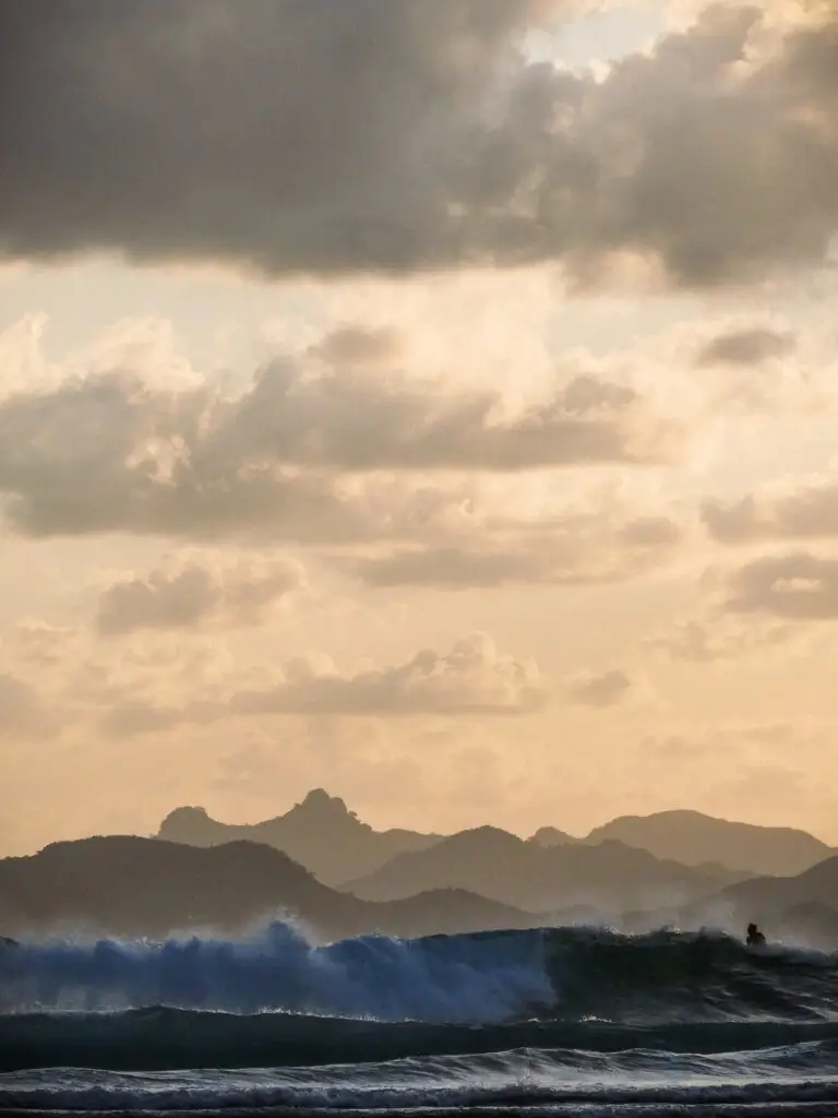 Waves and mountains melting together at Mawi Beach in Lombok