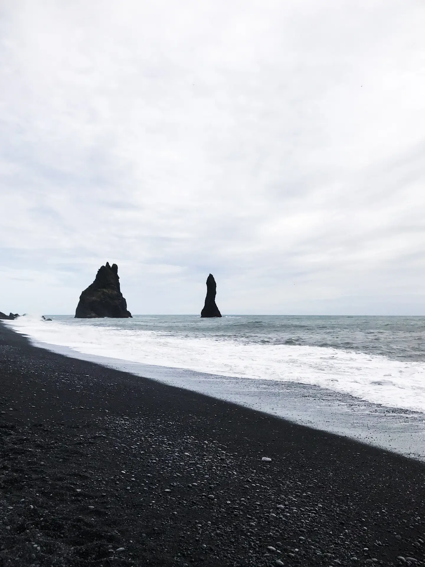 Explore Iceland and the black sand beach in Vik