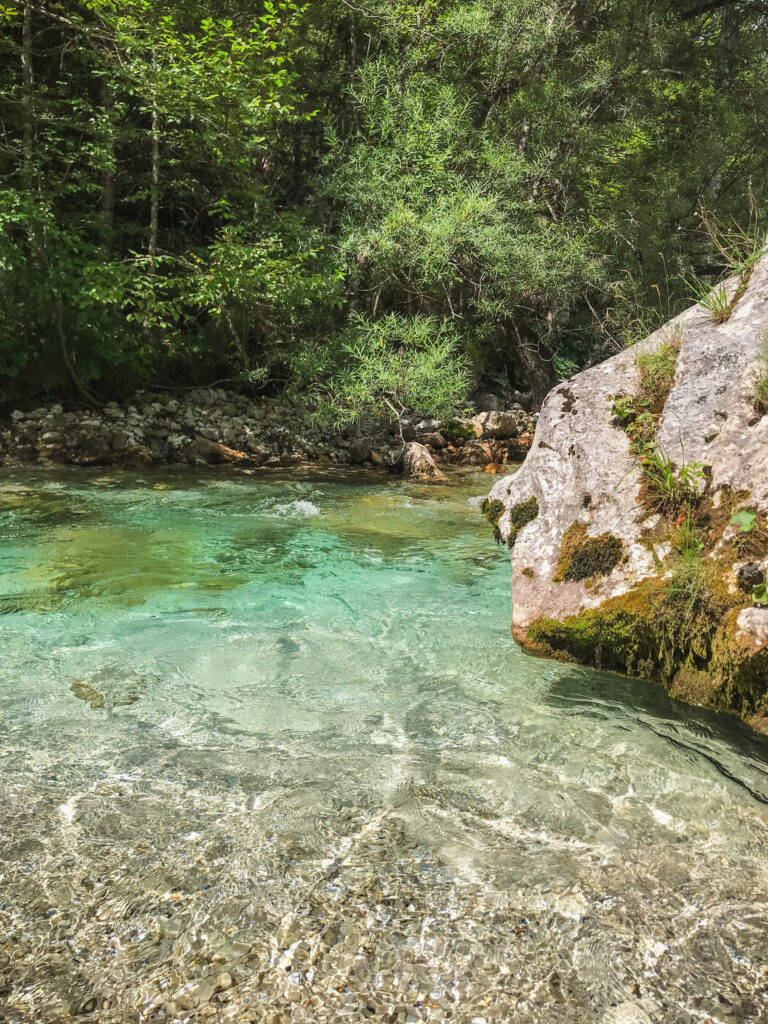 Crystal clear water is one of Soča River's characteristics