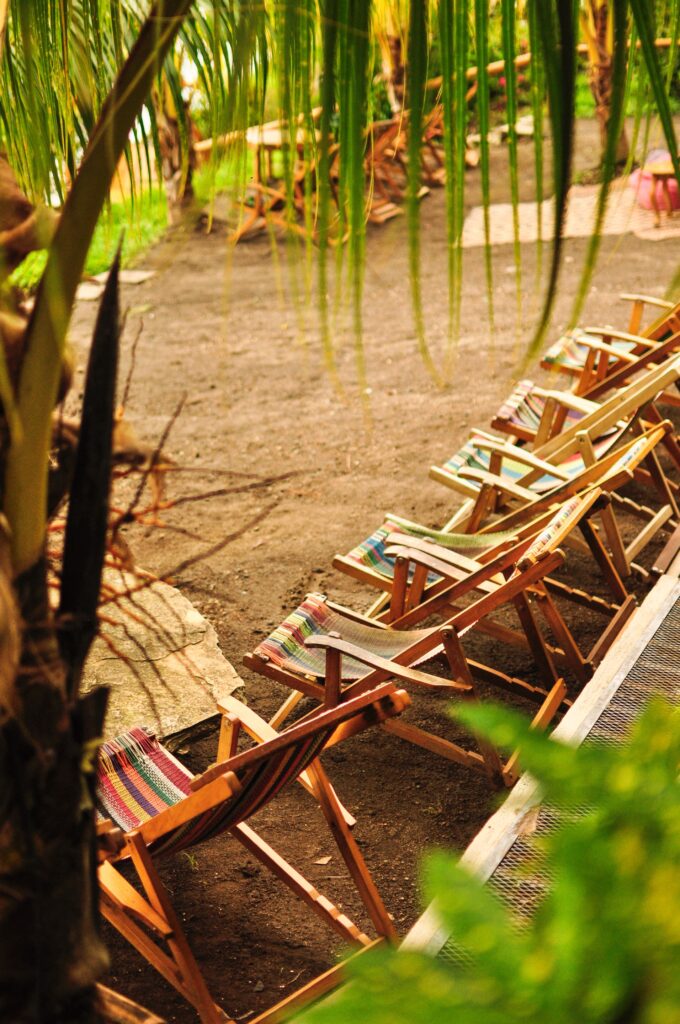 Sunbeds and relaxing area at Paradiso Hostel