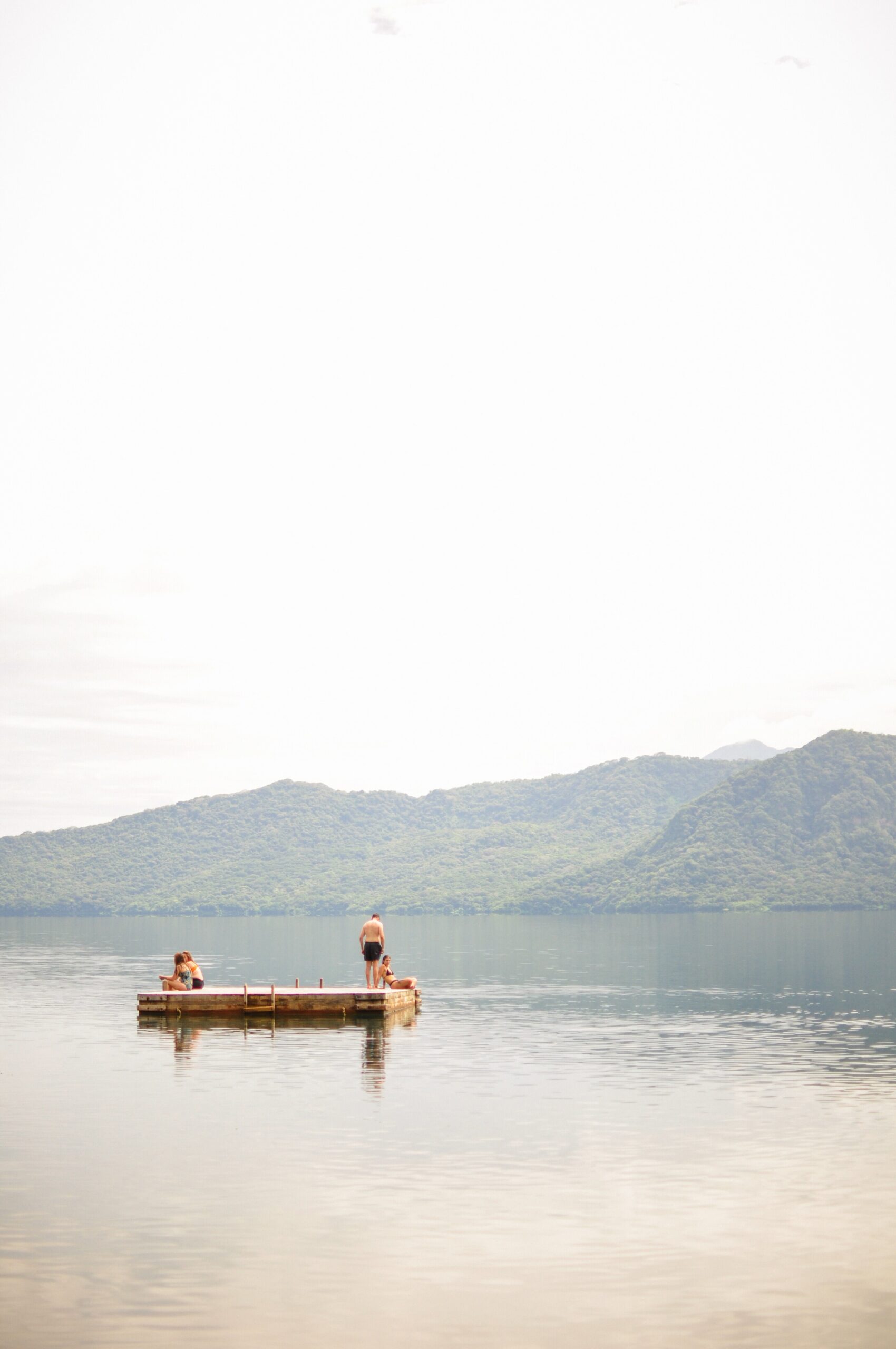 People enjoying Paradiso Beach Club in Laguna de Apoyo